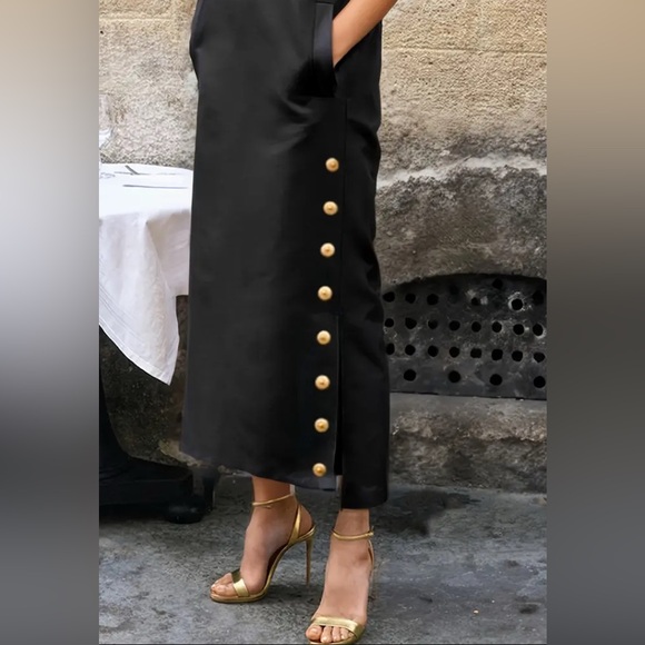 Elegant Black Sleeveless Dress with Gold Button Accents - Picture 3 of 5